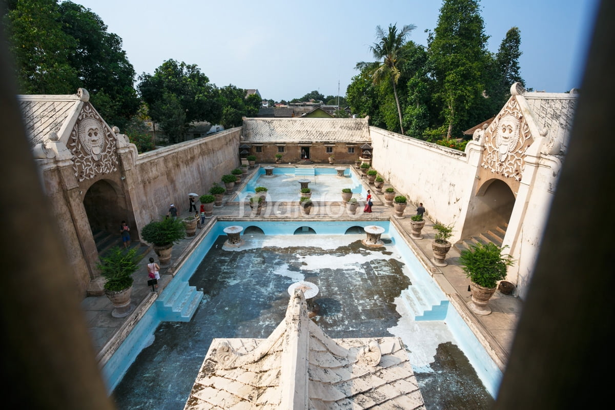 A view of Umbul Pasiraman pools with surrounding structures at Taman Sari, Yogyakarta.