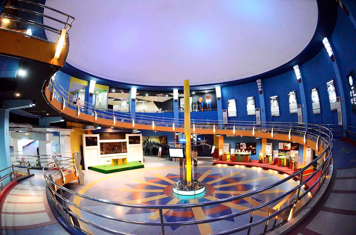 The interior of the Dome Area in Taman Pintar Yogyakarta showing exhibits and interactive displays.