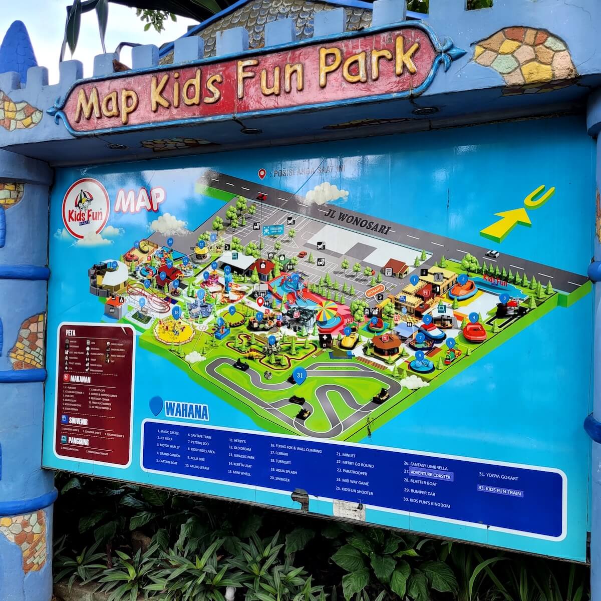 A colorful map of Kids Fun Park showing various attractions and rides.