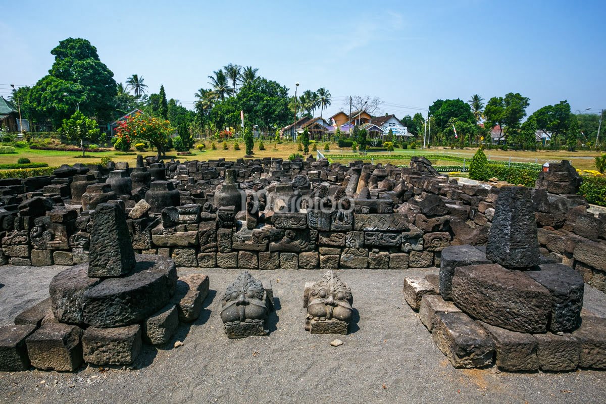 Ruins of ancient stone structures at Mendut Temple.