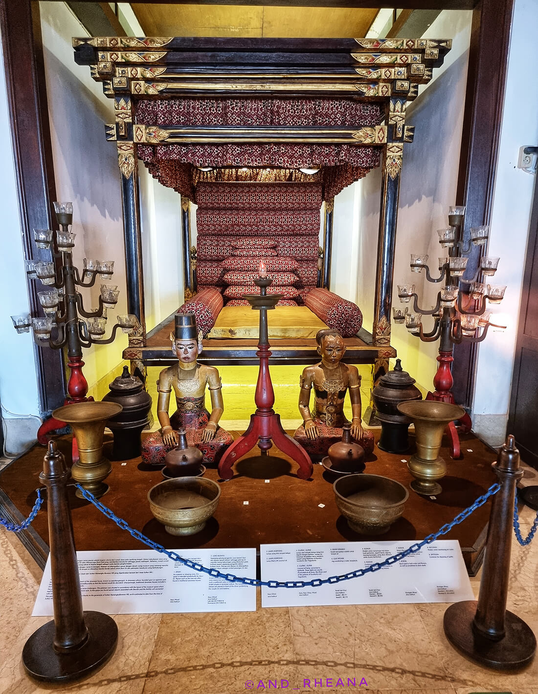 Traditional Javanese bridal bed with mannequins and ceremonial items at the Sonobudoyo Museum.