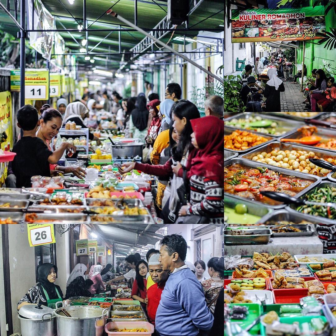 Ramadan market in Kauman Tourism Village with people buying food and snacks for breaking the fast.